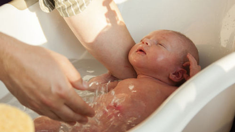 Dad Demonstrating Bathing Techniques